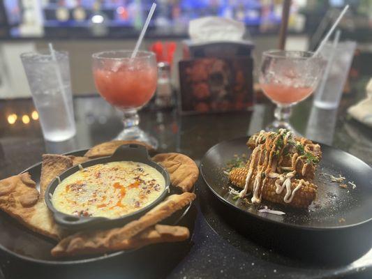 Raspberry Margaritas  Elote Ribz / queso with chorizo w/frybread