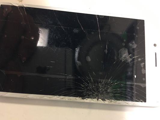 We fix your cracked or otherwise broken cellphones - This is before we fixed this iphone