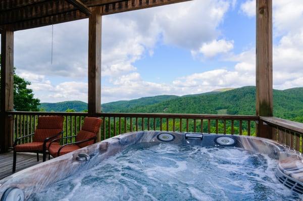 Some cabins have hot tubs with gorgeous mountain views.