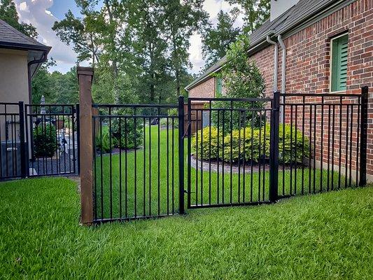 Conroe TX Fence contractors near Lake Conroe, TX installed a wrought iron fence.