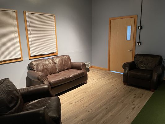 Private room and sitting area for the game and golf simulator