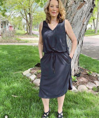 Black sleeveless silk dress