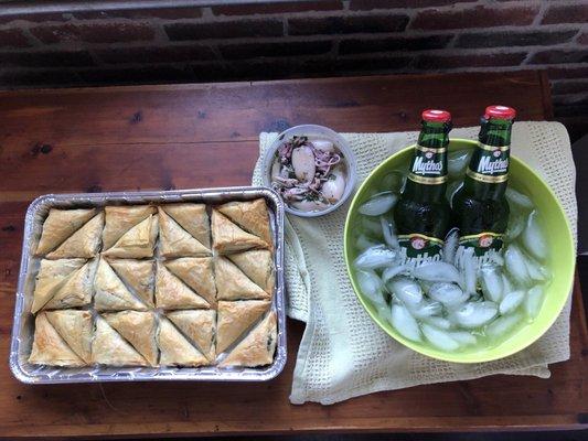 Spinach Pie, marinated squid, and two cold ones of Mythos, all thanks to Sophia's