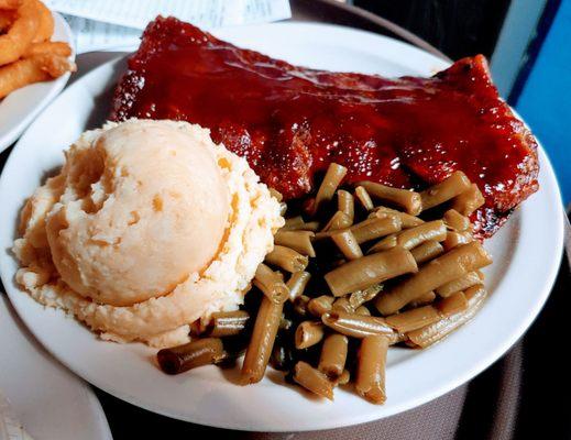 1/2 Slab of House Smoked Ribs with your choice of 2 Sides $10.50! Homemade Mashed potatoes!