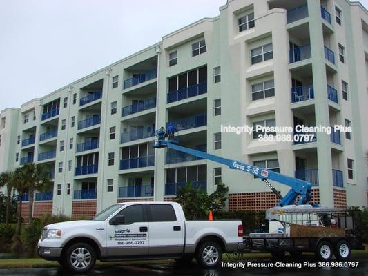 Pressure washing 6 stories condo from boom lift.  Removing mold and mildew call 386.986.0797