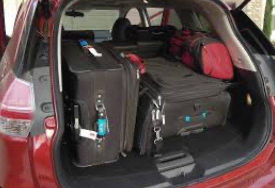 Our 2017 Nissan Rogue Sport can fit up to to 3 standard size luggage's in the trunk space of the car. Car fits up to 4 people.