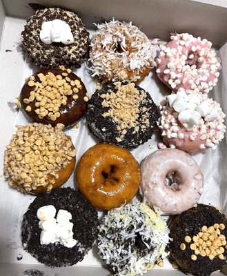 Customized donuts. They have strawberry, caramel, chocolate, glazed, coffee, smore's and more