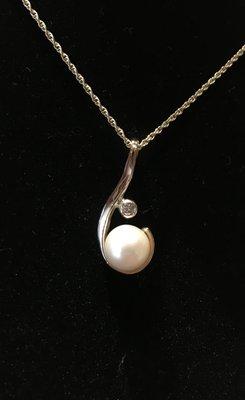 Custom diamond and pearl pendant.