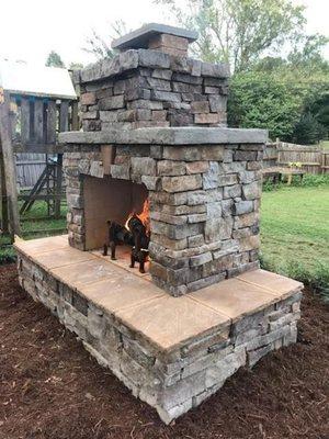 Back yard stone fireplace