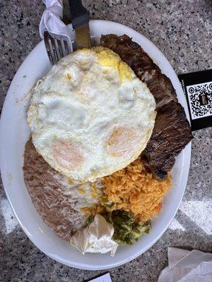 Steak , eggs, with chiliquiles