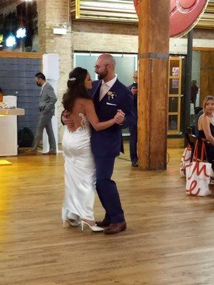 The wedding couple dancing the night away.