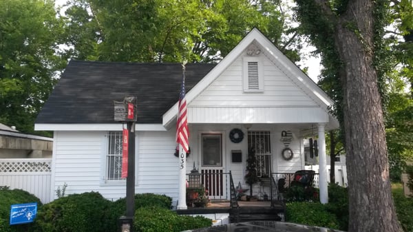 New roof and vinyl siding for this cute real estate office