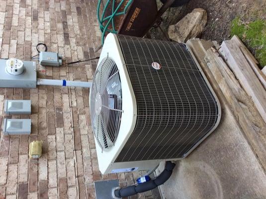 This newly installed heat pump will keep it's homeowners cool this summer. (And many more to follow)