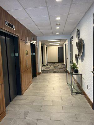 The elevator lobby at the building for Novant Health Primary Care Lindley Park.