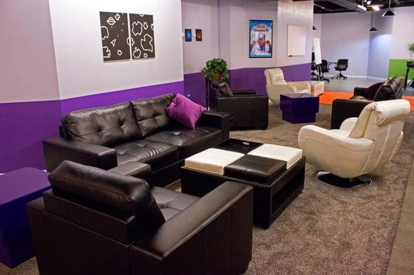 Comfortable bar/lounge area with 3 flat screen TVs.