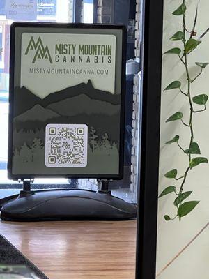 QR Code and shop sign