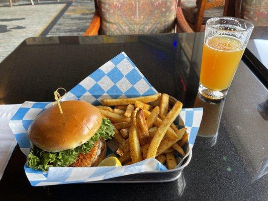 Salmon sandwich and fries.