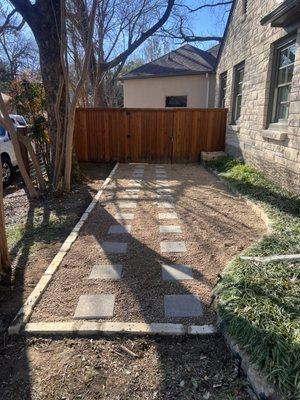 Stone edging, pavers, and pea gravel