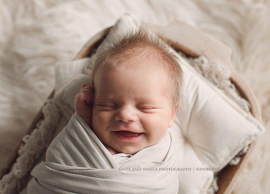 newborn baby smile