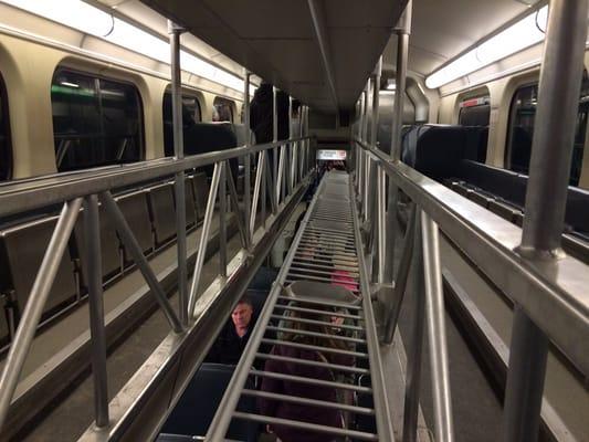 Upper seating area and luggage rack on a Metra waggon