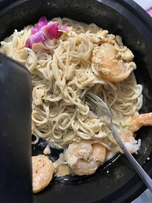 Shrimp and crab pasta in brandy cream sauce. Translation..., tasteless, garlicky fishy overcooked pasta with no flavor