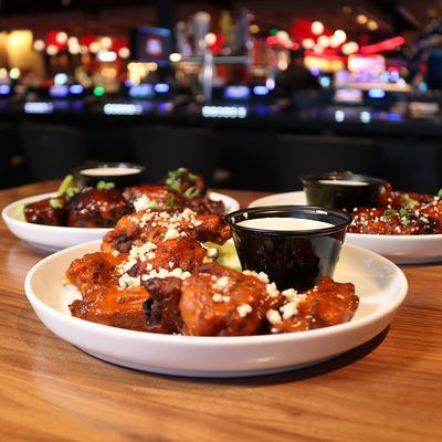 Jack's Bar + Grill offers delicious wings! With a variety of flavors, this is a dining special!