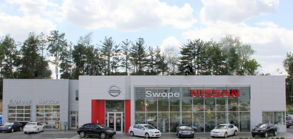 Swope Nissan is located on the hill, in the center of the Swope Family of Dealerships Auto Center.