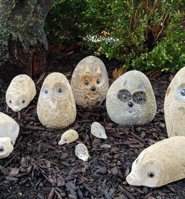 carved rock garden critters