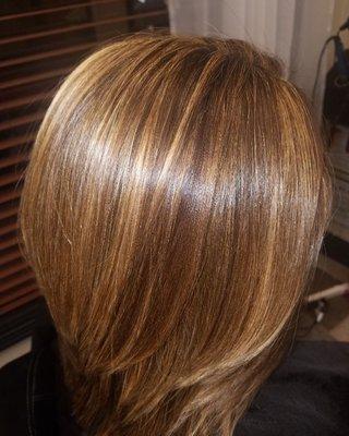 New client wanted natural highlights to blend out her multi colored hair.