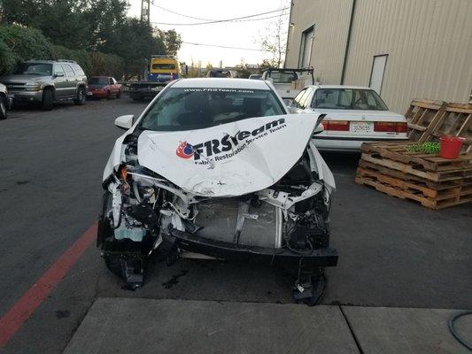 This is what's left of Custom Commercial Dry Cleaners car.