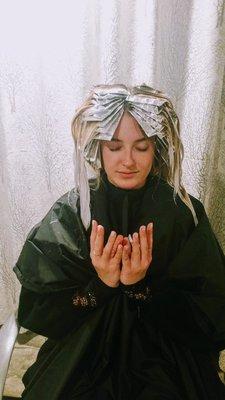 Here is a client in lotus mudra while her foils process.  Expert Hair + World Class Meditation.