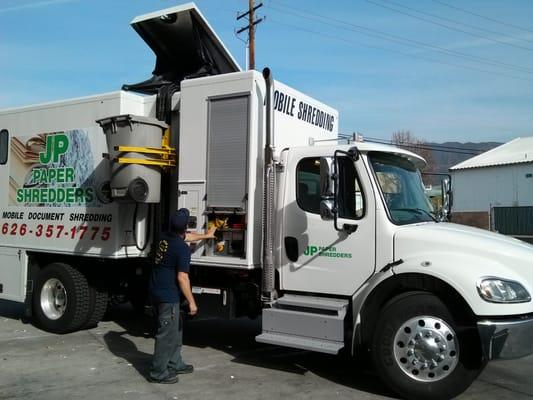 JP Paper's secure mobile shredding unit with operator Darrell Leiby