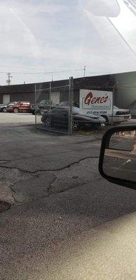 Trans Am ran into the metal gate right below Gene's transmissions business sign.