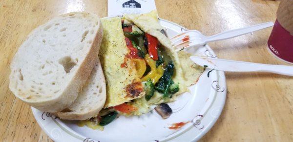 3 Egg Omelet,  with mushrooms, fresh tomatoes,  spinach and peppers , with sourdough toast.  AWESOME.