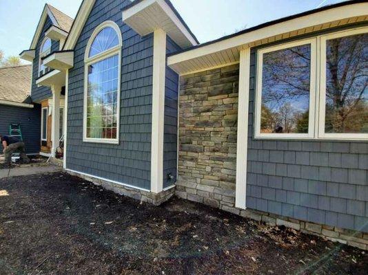 Royal siding, stone veneer