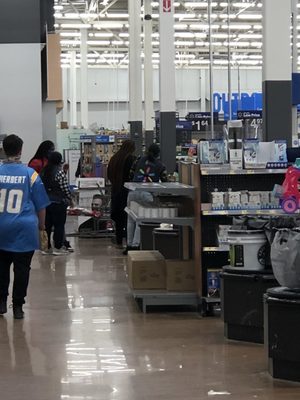 Obnoxious Walmart worker standing around doing absolutely nothing!