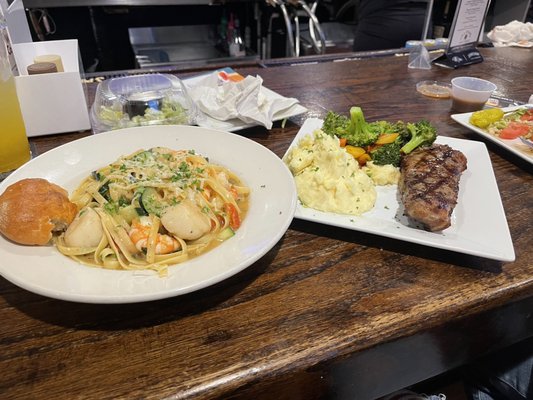 Shrimp and Scallop Scampi and New York Strip Specials. So frieken good!!!