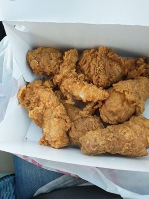 Fried chicken tenders and drumsticks