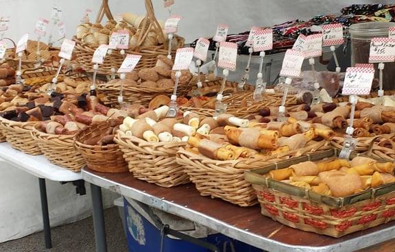 Dog treats for sale from a vendor booth.