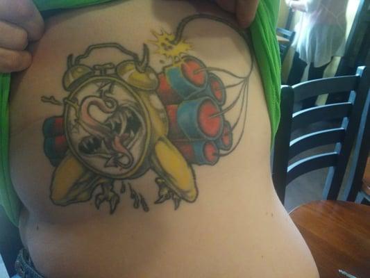 Awesome color tattoo over 9 years old with zero touch ups.