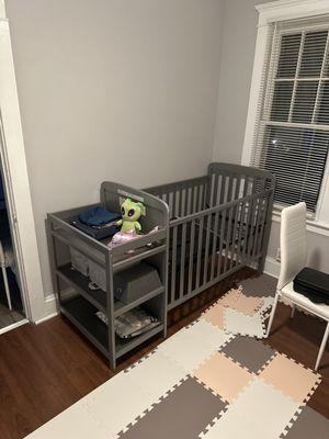 Assembling a baby cot