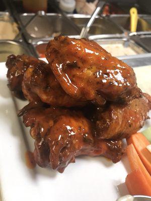 Sweet and spicy buffalo wings with house made cajun ranch dressing