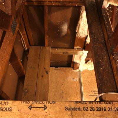 The pass-through from the upper to lower attic.