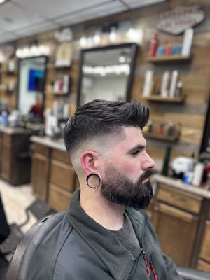 High skin fade with messy top