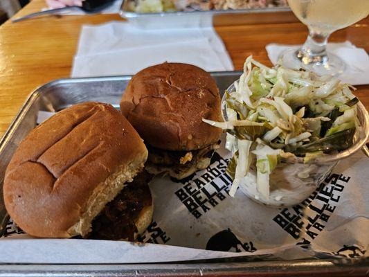 Brisket slider, pork belly slider, cole slaw.