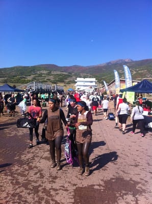 Main walkway with food, vendors, booths, and registration.