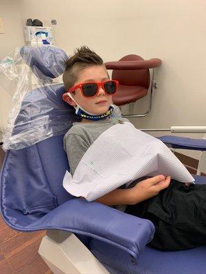 My son in the shades Dr. Abrams gave him for a cleaning.