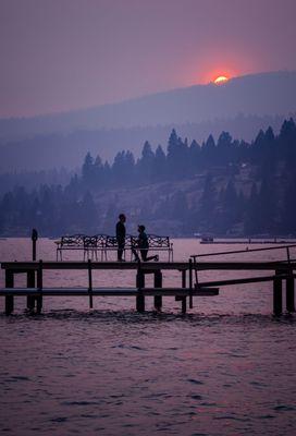 Sunset engagement on the dock of Franciscan Lakeside Lodge. Smoky skies made for an epic sunset and photo. 9/14/20 .