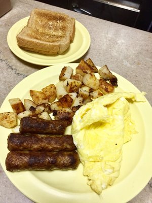 Sausage, 2 eggs, potatoes, and toast for $7. Great deal.