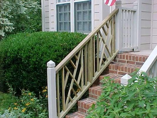 We replaced a rotted railing with pressure treated wood.  It is pictured here prior to painting.